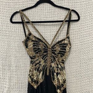 Beautiful butterfly beaded sequined formal prom gown in excellent condition.